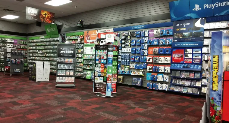 Images of video game store with a lot of physical disc game collection.